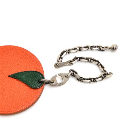 hermes orange charm